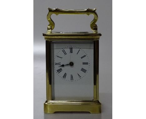 A French brass cased carriage clock.
