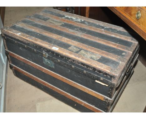 A Victorian slat bound 2 handled travelling trunk, length 86cm.
