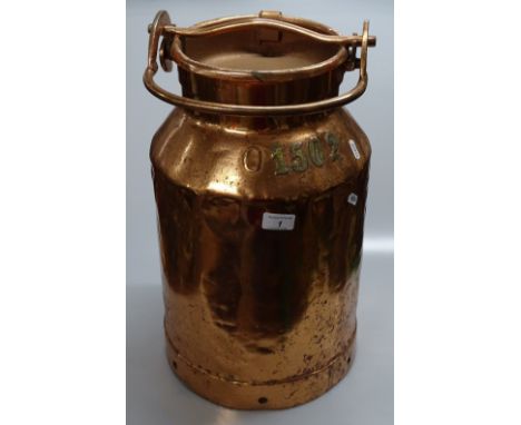 A Vintage copper milk churn, height to lid 19".