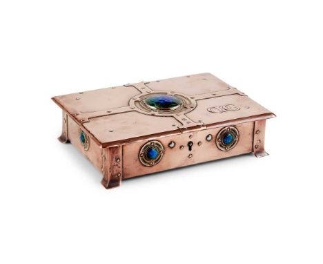 copper, with applied blue/green enamel roundels, embossed initials MC, with velvet and silk lined interior20cm wide, 5cm high