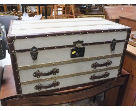 A MODERN PACKING TRUNK WITH LIFT UP ID AND TWO DRAWERS W 80 CM