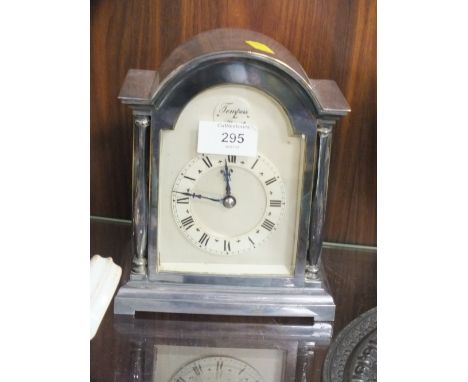 A SILVER PLATED TEMPUS FUGIT MANTLE CLOCK