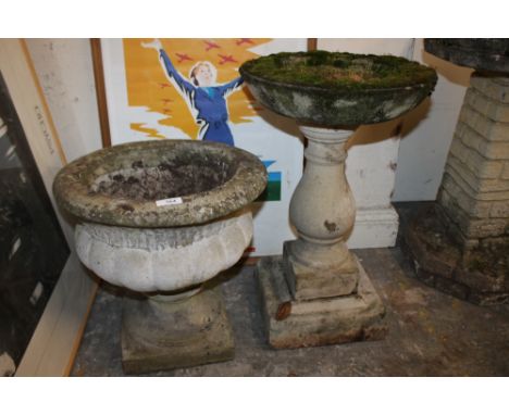 A STONE PLANTER ON PLINTH TOGETHER WITH A BIRDBATH ON PLINTH