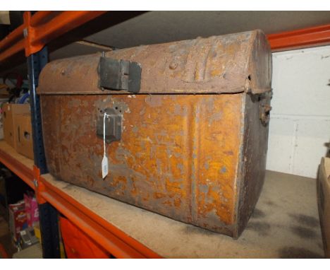 A VINTAGE METAL TRUNK