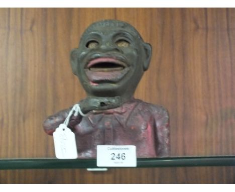 A VINTAGE CAST METAL LITTLE JOE MONEY BANK 