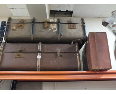 TWO LARGE VINTAGE BANDED PACKING TRUNKS TOGETHER WITH A LEATHER SUITCASE (3) 