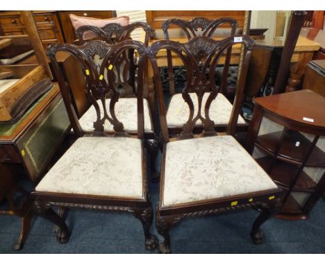 A SET OF FOUR REPRODUCTION MAHOGANY CHIPPENDALE DESIGN DINING CHAIRS