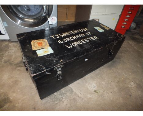 A BLACK METAL TRUNK