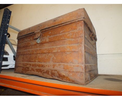 A VINTAGE METAL TRUNK