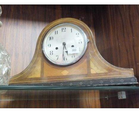 AN INLAID MAHOGANY NAPOLEON HAT MANTLE CLOCK TOGETHER WITH AN OAK EXAMPLE (2) 