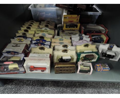 A shelf of modern diecasts including Oxford, Models of Yesteryear, Matchbox, Burago etc, all boxed, approx 40