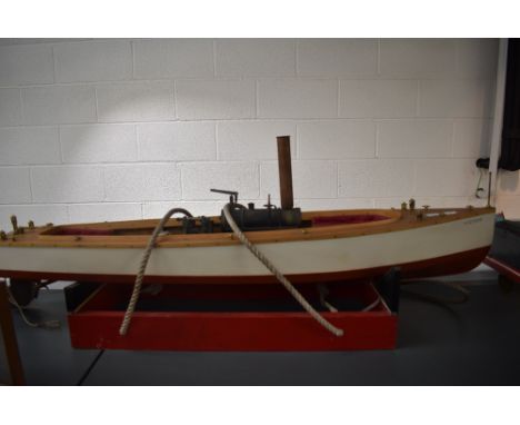 A Live Steam hand built wooden model Cruiser Boat having twin piston vertical engine, brass and copper boiler, seating area a