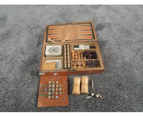 A late 19th century Games Compendium in fitted wooden case containing two sets of James English Bridge Row London Playing Car