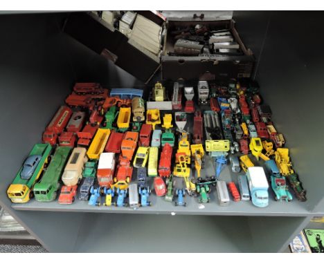 A shelf of playworn diecasts including Corgi Karrier Bantam Milk Van, Dinky Massey Harris Tractor, Dinky Volkswagen, Lesney T