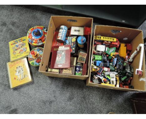 Two boxes of playworn diecasts including Corgi, Dinky, Britains etc and Chad Valley tin plate spinning tops, cards games, The