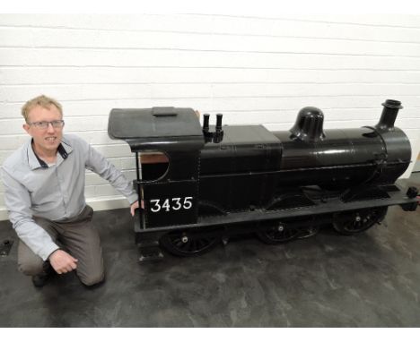 A unique hand made wooden 1:4 scale LMS 0-6-0 Loco &amp; Tender 3435 having lawn mower powered engine, with extra wagon, tota