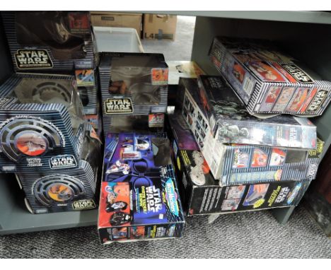 A shelf of Micro Machines Star Wars Accessories including Millennium Falcon, The Death Star, Darth Vader Bespin, Action Fleet