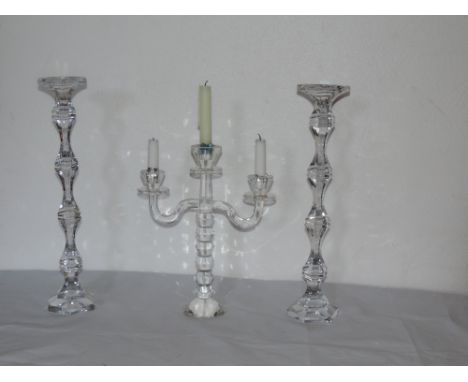 A pair of tall glass Candlesticks, approx. 46cms (18") high, and a three light glass Candelabra. (3)