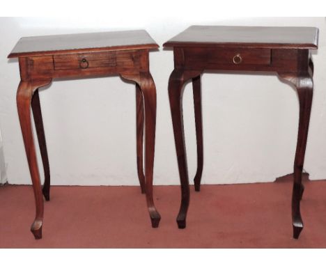 A pair of mahogany Bedside or Lamp Tables, with frieze drawer, on cabriole type legs, 56cms (22") wide. (2)