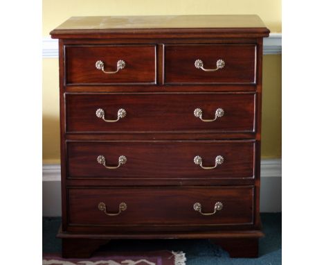 A matching pair of heavy mahogany Chests, with moulded tops over two short and three long drawers, on bracket feet, 96cms (38
