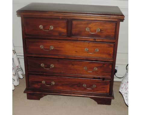 A matching pair of heavy mahogany Chests, with moulded tops over two short and three long drawers, on bracket feet, 96cms (38