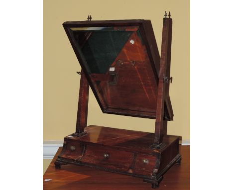 A small Georgian mahogany Dressing Table Mirror, c. 1800, the box base with moulded drawers on ogee bracket feet. (1)