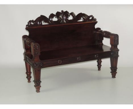 An important Irish William IV period carved mahogany Hall Bench, in the style of Williams and Gibton, with carved and pierced