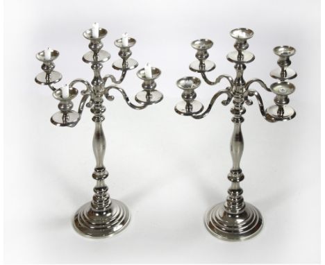 A pair of tall heavy silvered five light four branch Candelabra, approx. 85cms (33 1/2") high. (1)