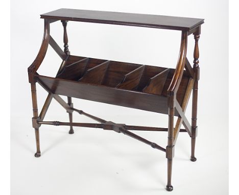 A very unusual mahogany Book Rack, the rectangular top over a deep shelf in the form of a trough, with turned uprights, open 