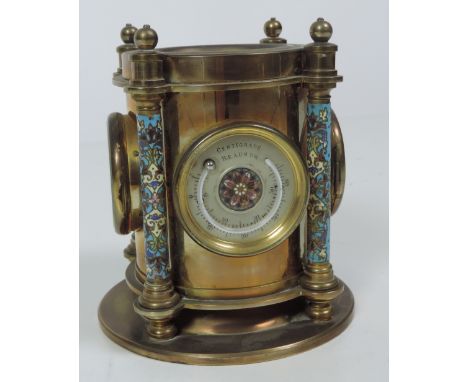 An unusual 19th Century heavy brass four sided Clock Barometer, Thermometer, the circular design with inset compass on top, s