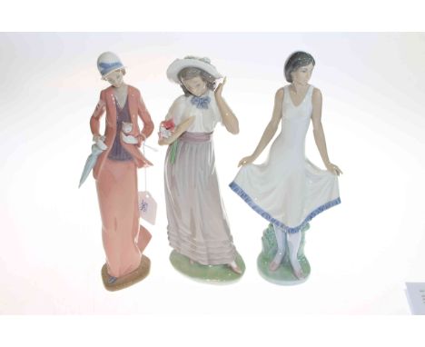 Three Nao figures of Ladies