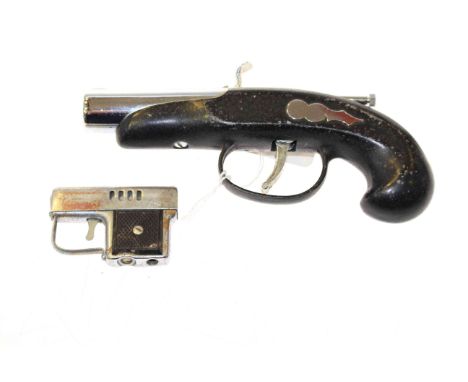 Two vintage pistol-form lighters