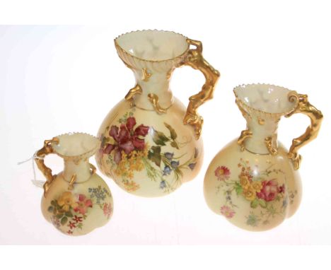 Set of three graduated Royal Worcester blush ivory floral decorated jugs, no. 1507