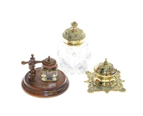 Large heavy brass topped glass inkwell and two other inkwells (3)