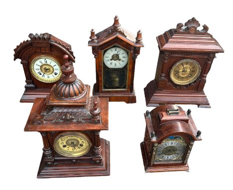 A collection of five wooden mantle clocks, with one Dutch clock by Franz Hermle, The "Greenwich" clock made in Wurtemberg for