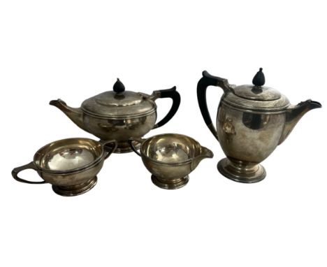 A matching Mappin &amp; Webb four piece tea service with marks for Sheffield 1934. Comprising of a teapot, hot water pot, twi