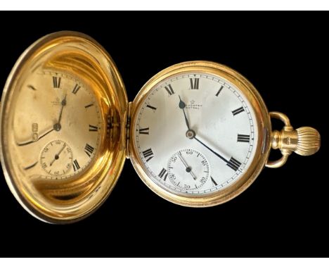 18ct gold pocket watch by Astral of Coventry. White enamel dial with Roman numeral hour markers and seconds subsidiary displa