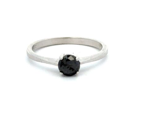 A black single stone ring, size M. Black stone approx 5mm in diameter. Set in 9ct white gold. Weight 1.77g. Please see the bu