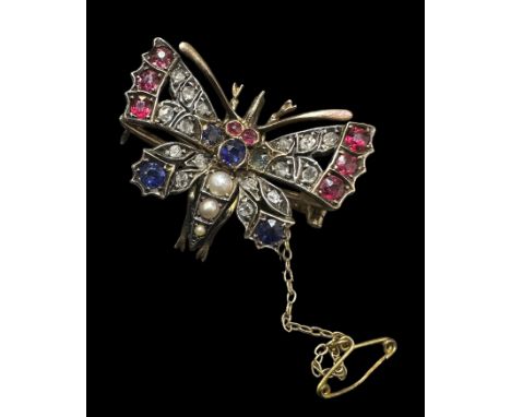 A late Victorian butterfly brooch which can also be worn as a pendant. The butterfly has 3 split pearls set as the abdomen wi