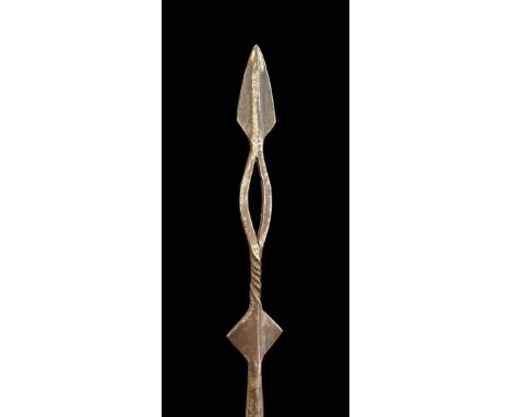Long double-sided spear, with ornate twisted Spear head with small arrow head on top of a hollow oval above tightly twisted b
