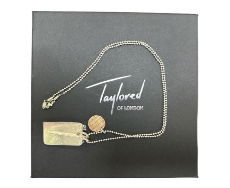 Roger Taylor - Taylored of London sterling silver dog tag set. Hand-made hallmarked sterling silver tag and drumstick with nu