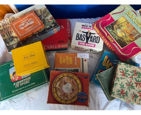 A collection of board games including vintage 