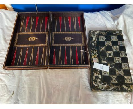 Folding chess/backgammon board and a mother of pearl inlaid board. 