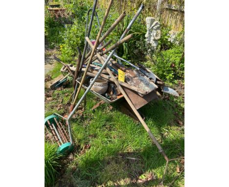 Wheelbarrow and tools. 