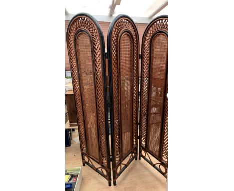 NOTE: BEAR WITHDRAWN - NEW LOT ADDEDA vintage wicker and cane room divider, with three panels, each panel 67” x 20”. 