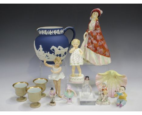A small group of decorative ceramics, including a Royal Worcester figure of a Chinese boy, No. 3073, a Royal Doulton figure T
