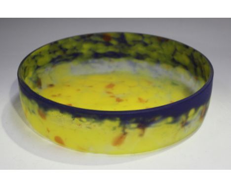 A Muller Frères Lunéville circular glass bowl, early 20th century, of mottled yellow colouring with orange splodges beneath a