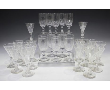 A collection of glassware, early 20th century and later, including a part suite of eleven claret and ten sherry, each bowl wi