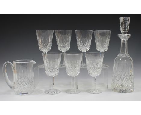 A Waterford Lismore pattern part suite of glassware, comprising seven water goblets, nine white wine glasses, two claret, fou