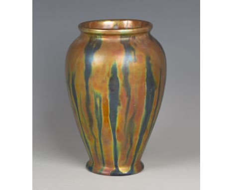 A Zsolnay Pécs lustre vase, the ovoid body covered in a green and orangey yellow iridescent glaze, lustre printed factory mar